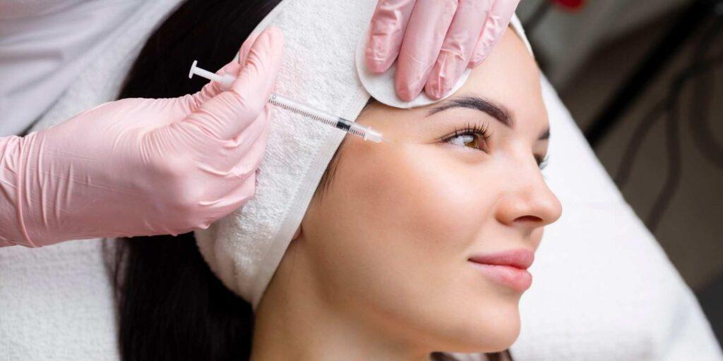 Botox Treatment in Udaipur Woman receiving botox anti-wrinkle injection at Vibra Clinics in Udaipur