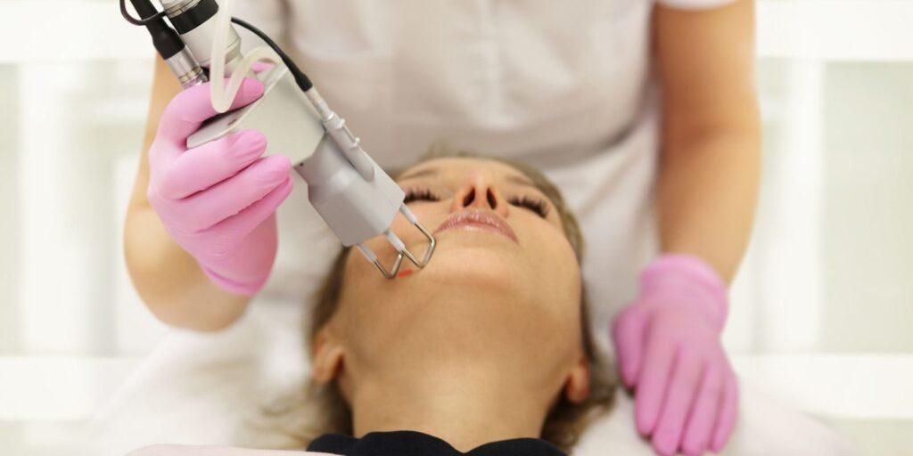 Client undergoing cosmetic skin treatment at Vibra Clinics in Udaipur