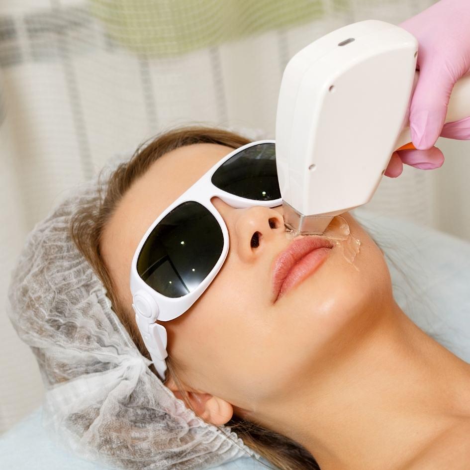 Client undergoing laser hair reduction treatment at Vibra Clinics, targeting unwanted hair with advanced, pain-minimized technology